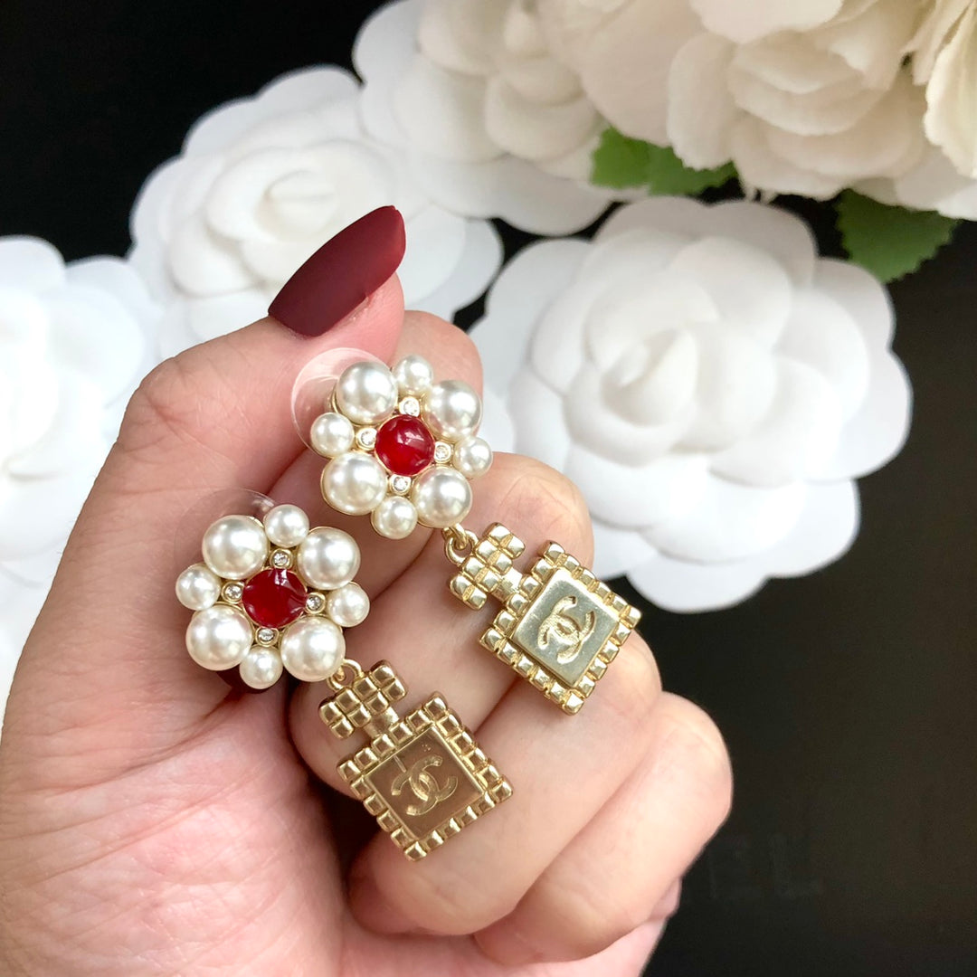 perfume bottle pearl earrings