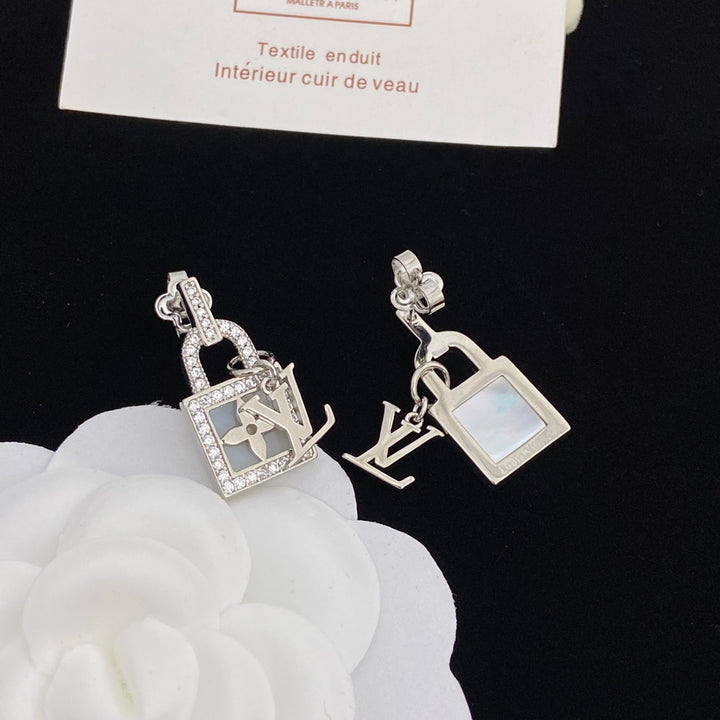 two-tone rhinestone lock earrings