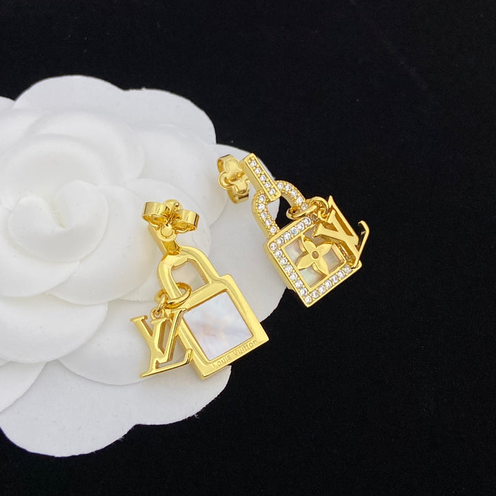two-tone rhinestone lock earrings