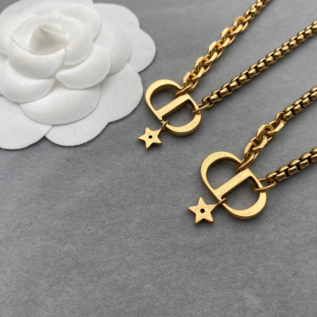 Exclusive letter “CD” gold necklace