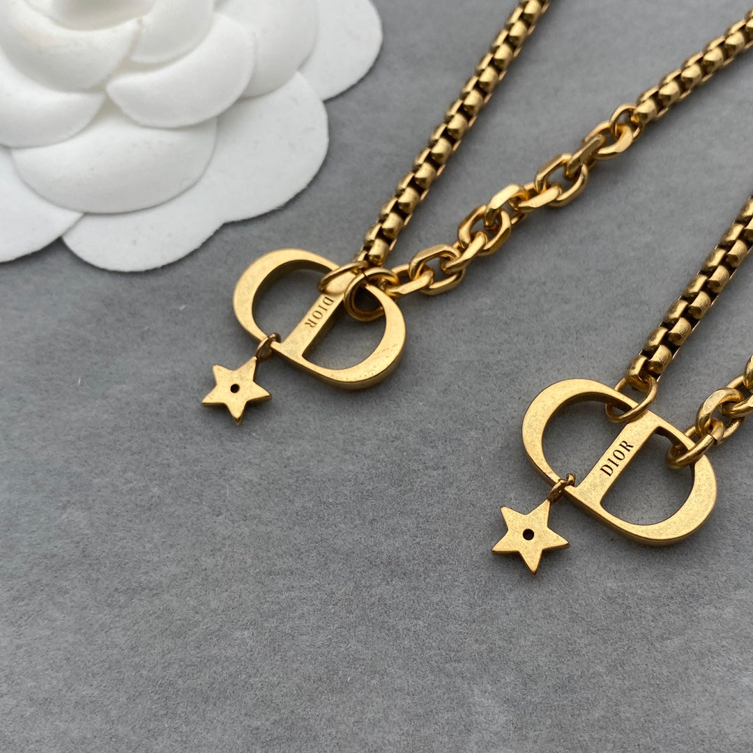 Exclusive letter “CD” gold necklace
