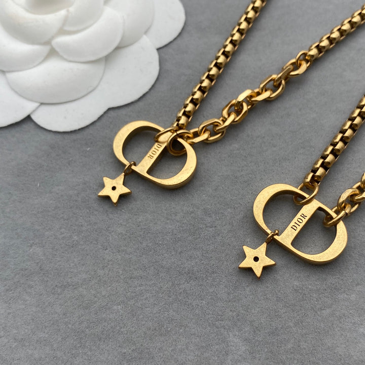 Exclusive letter “CD” gold necklace