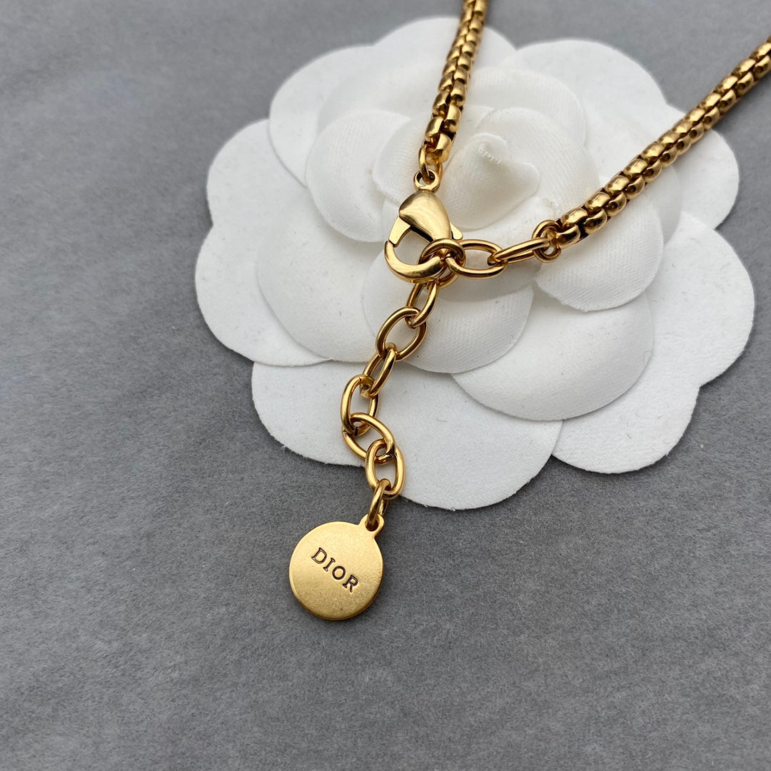Exclusive letter “CD” gold necklace