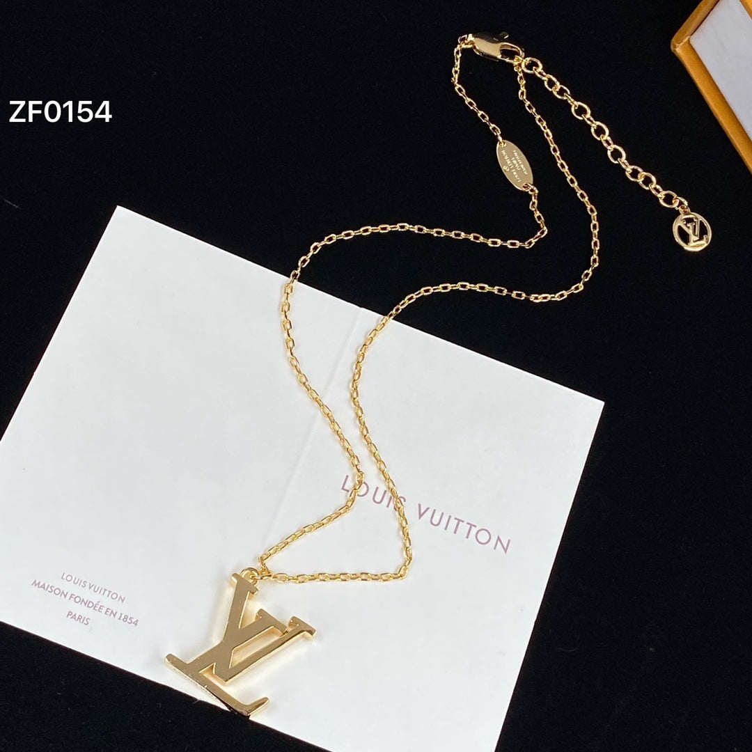 gold chain with iconic pendant necklace