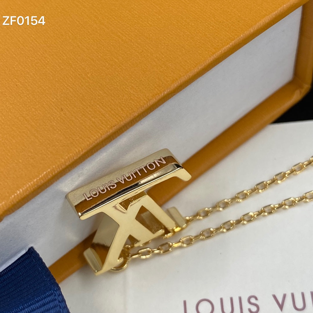gold chain with iconic pendant necklace