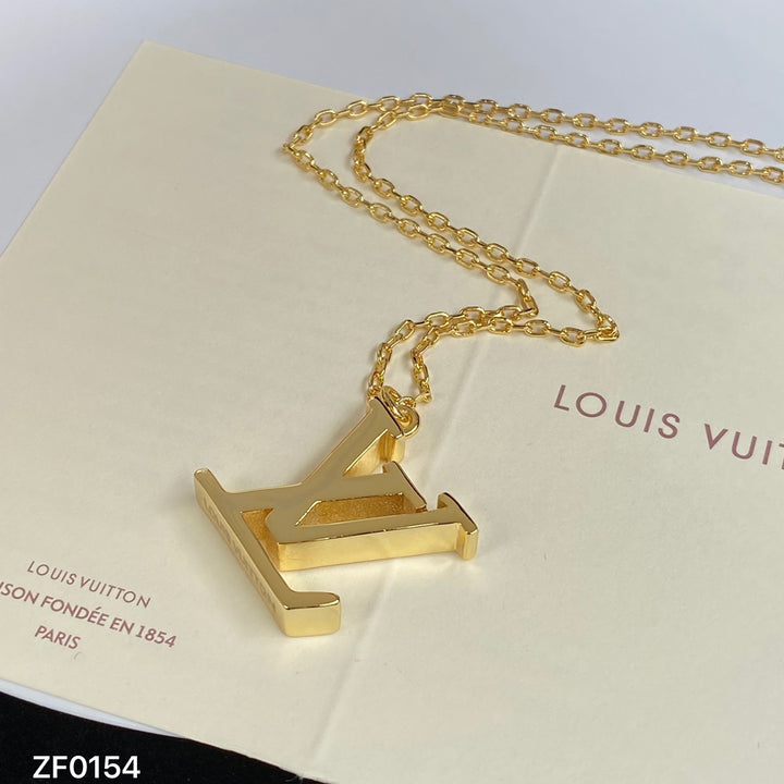 gold chain with iconic pendant necklace