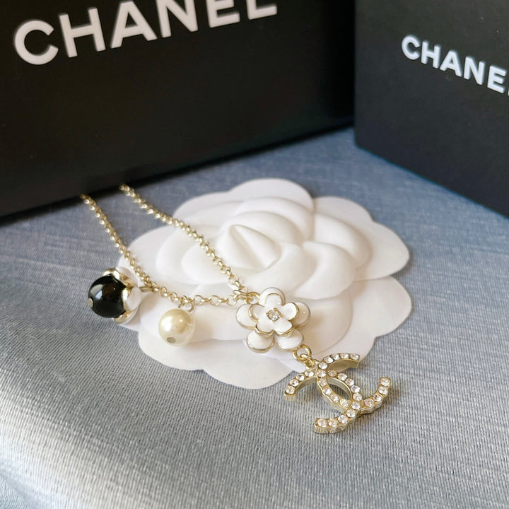 enameled pearl flower necklace