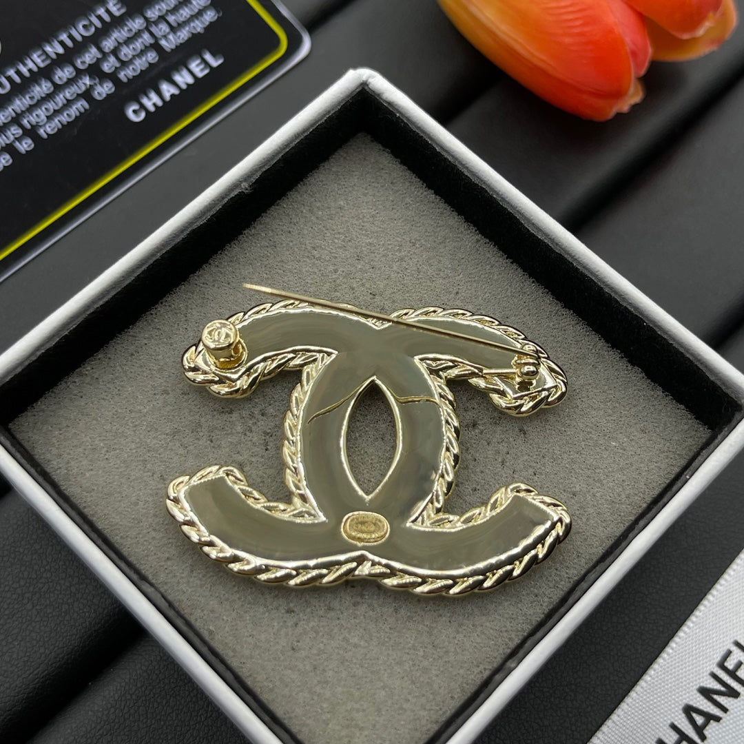 Black Enamel Brooch with Gold Setting