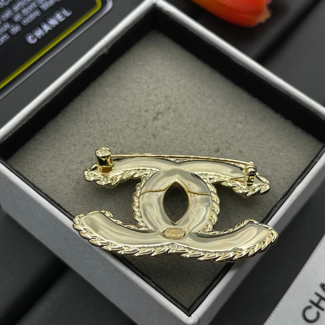 Black Enamel Brooch with Gold Setting