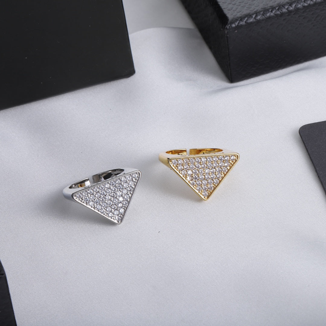 Triangle shaped ring with full diamonds