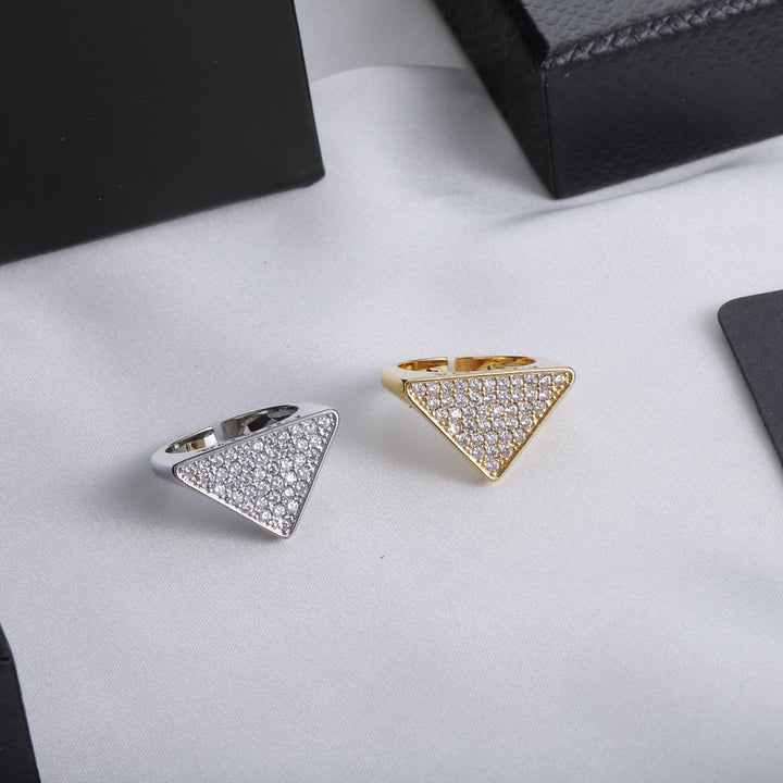 Triangle shaped ring with full diamonds