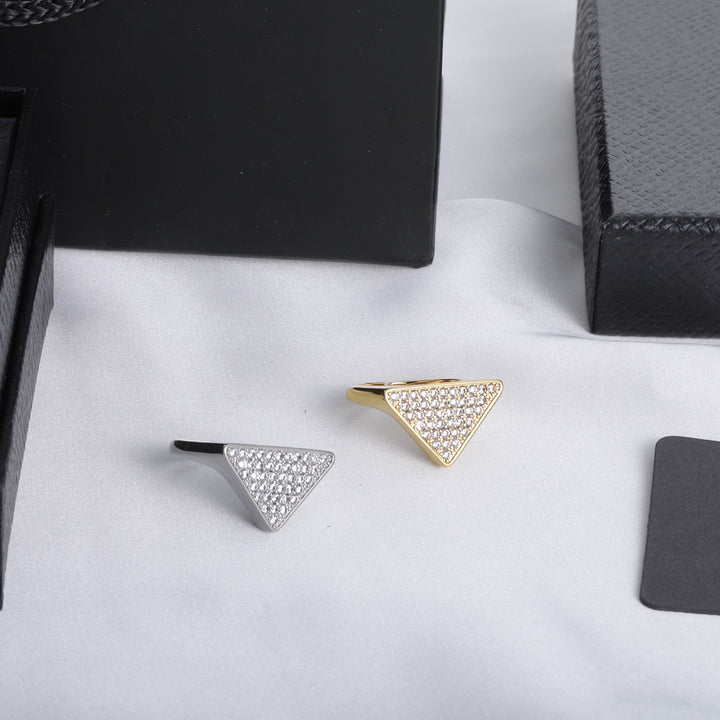 Triangle shaped ring with full diamonds