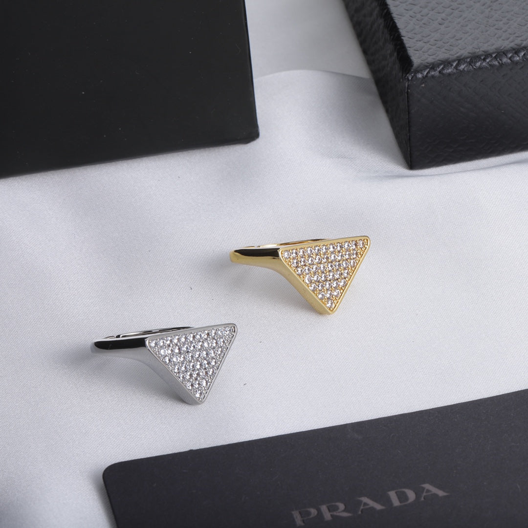 Triangle shaped ring with full diamonds