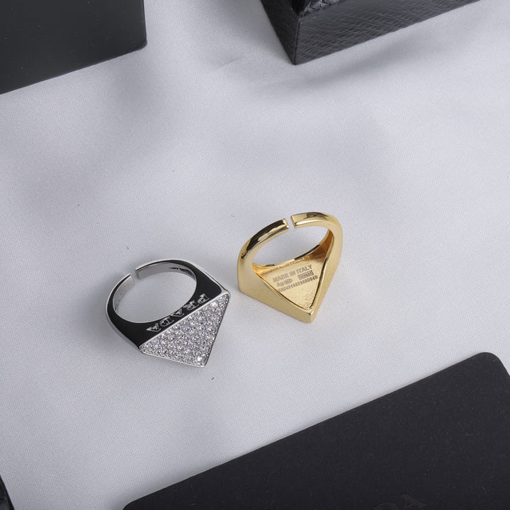 Triangle shaped ring with full diamonds