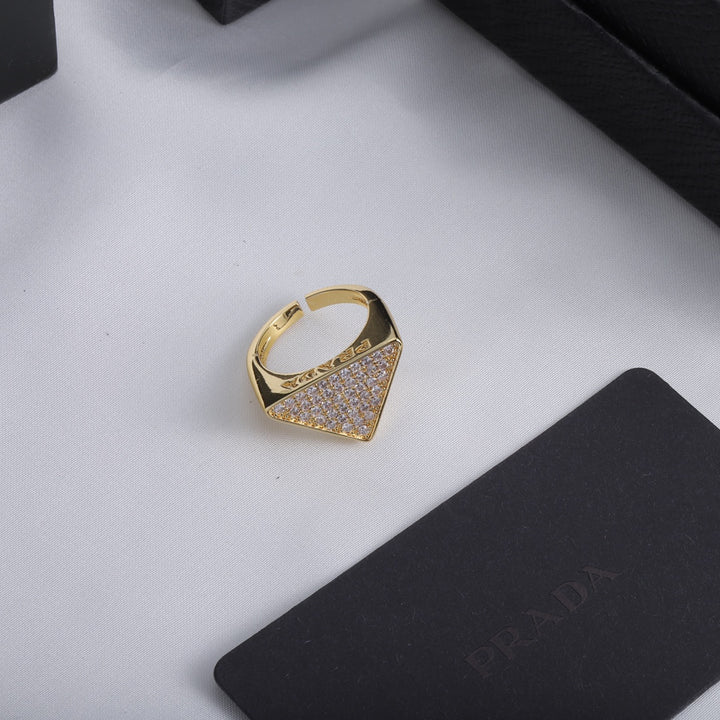 Triangle shaped ring with full diamonds
