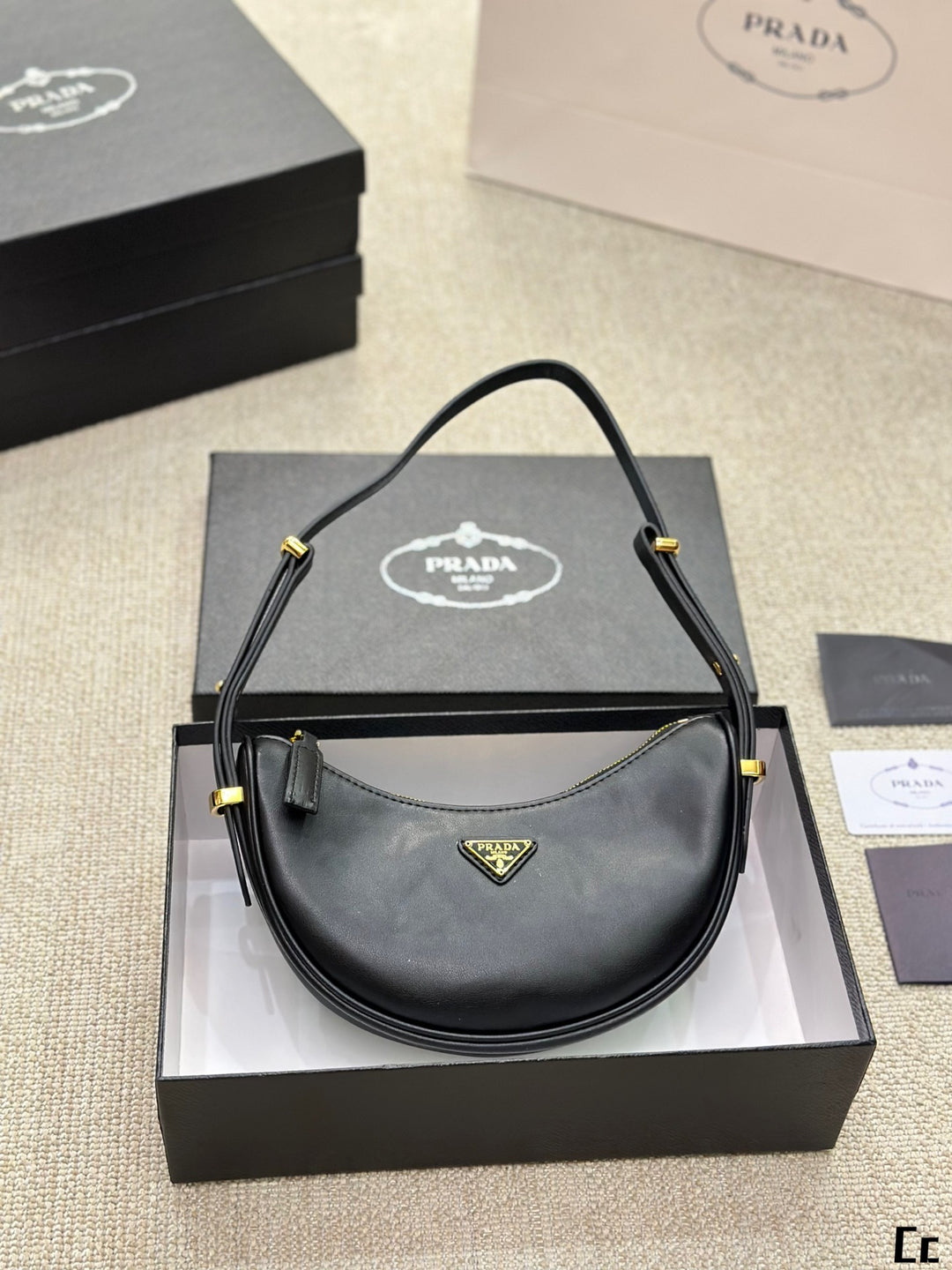 New Triangle Gold Label Half-Moon Underarm Bag