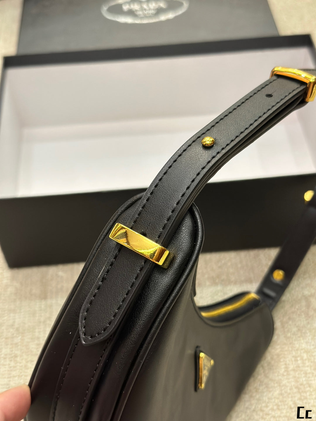 New Triangle Gold Label Half-Moon Underarm Bag
