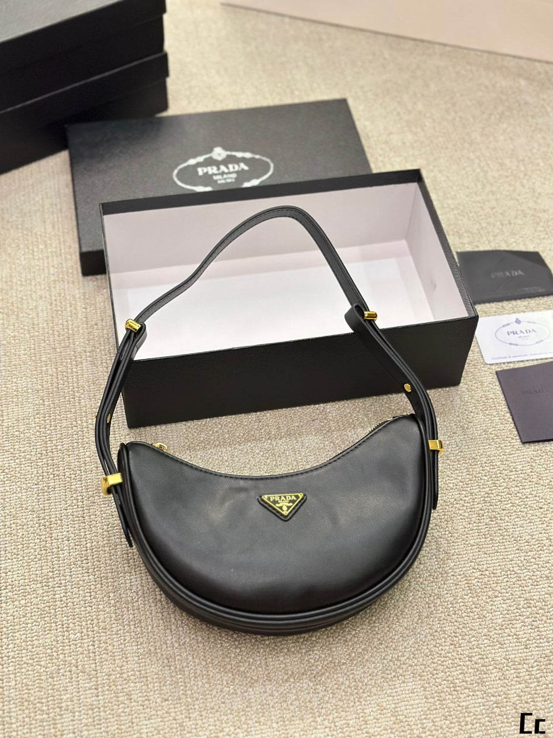 New Triangle Gold Label Half-Moon Underarm Bag