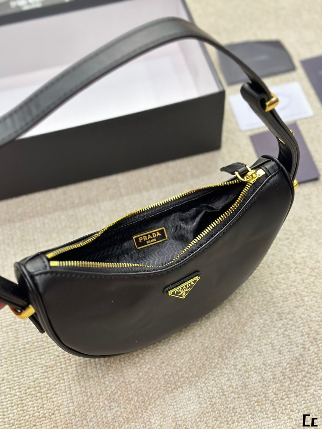 New Triangle Gold Label Half-Moon Underarm Bag