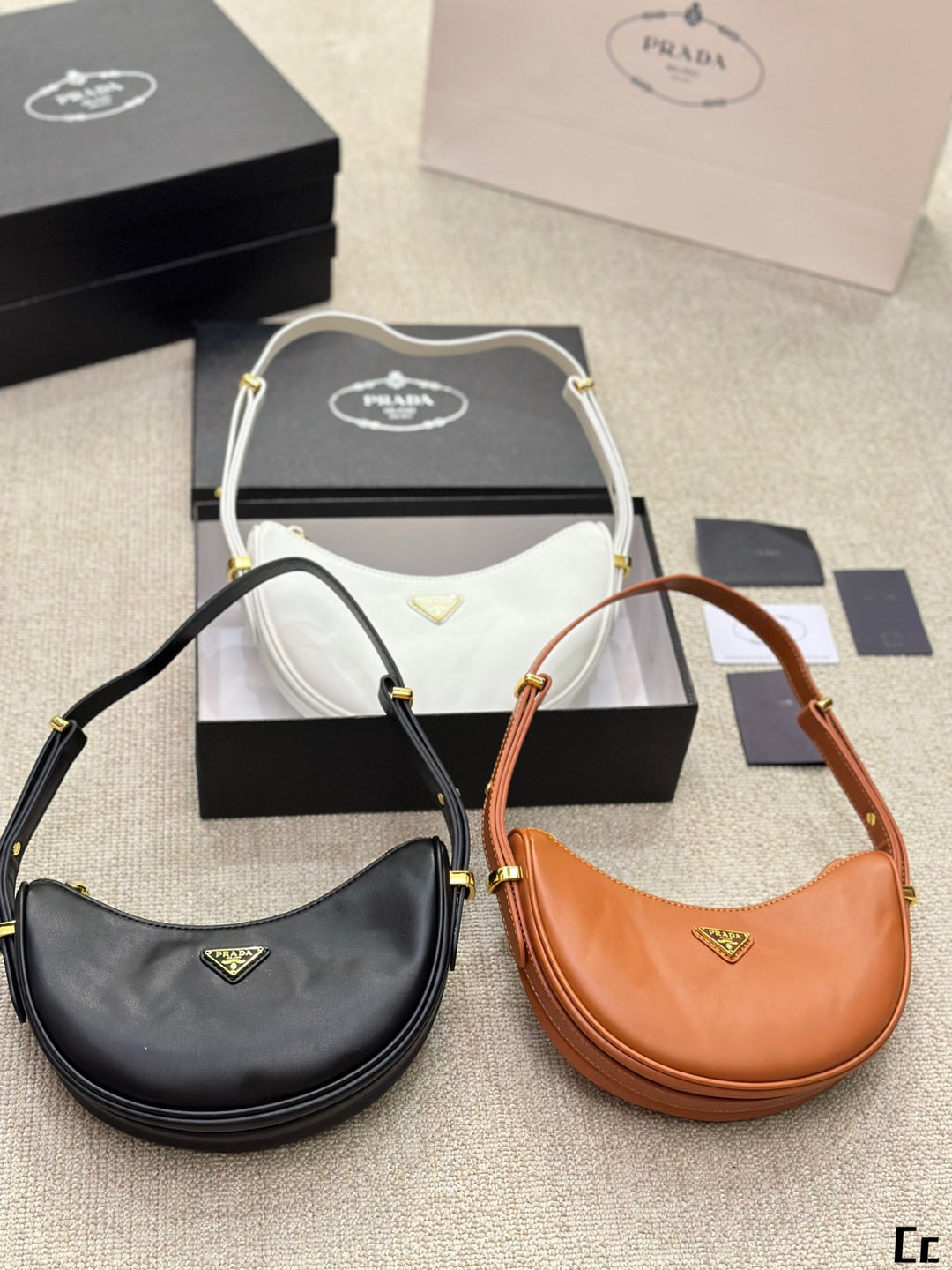 New Triangle Gold Label Half-Moon Underarm Bag