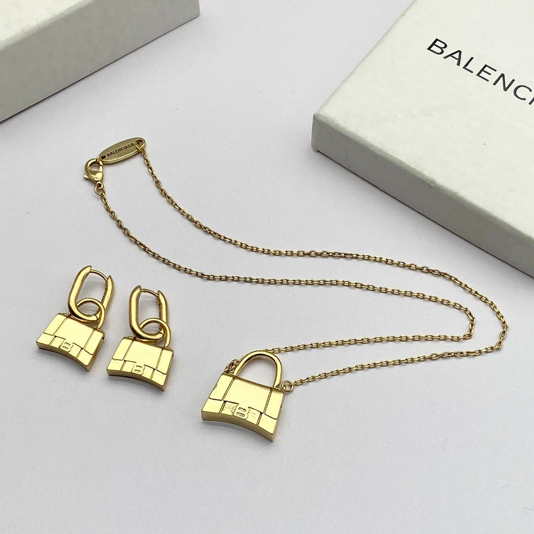 new gold bag pendant necklace