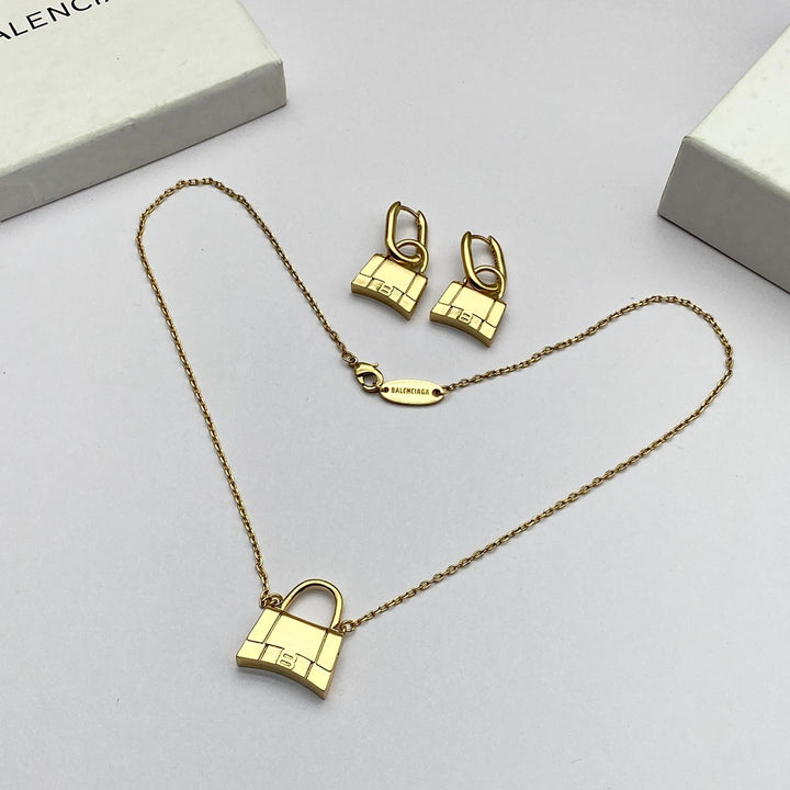 new gold bag pendant necklace