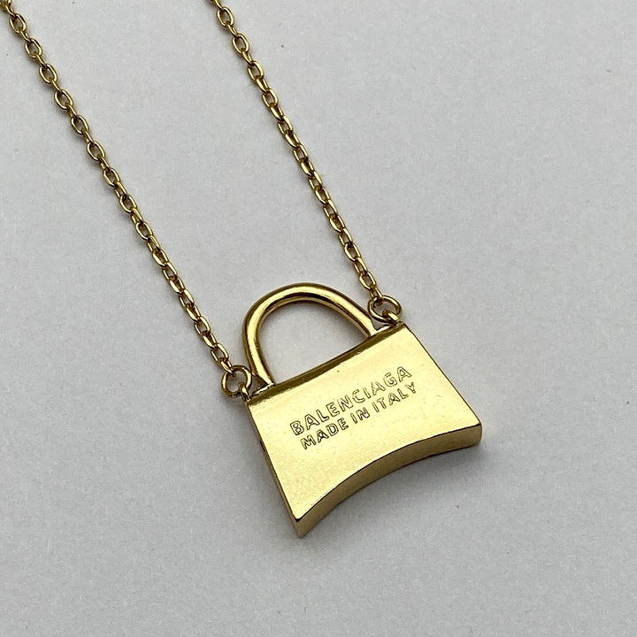 new gold bag pendant necklace