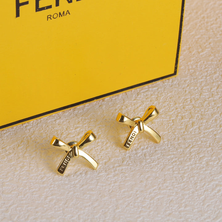 gold bow earrings