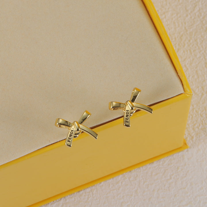 gold bow earrings