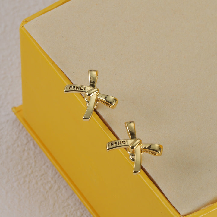 gold bow earrings