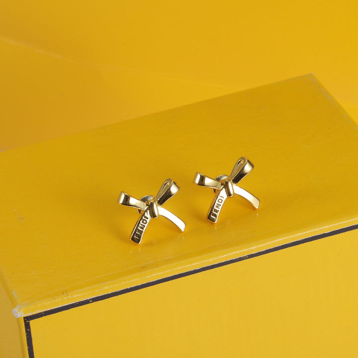 gold bow earrings
