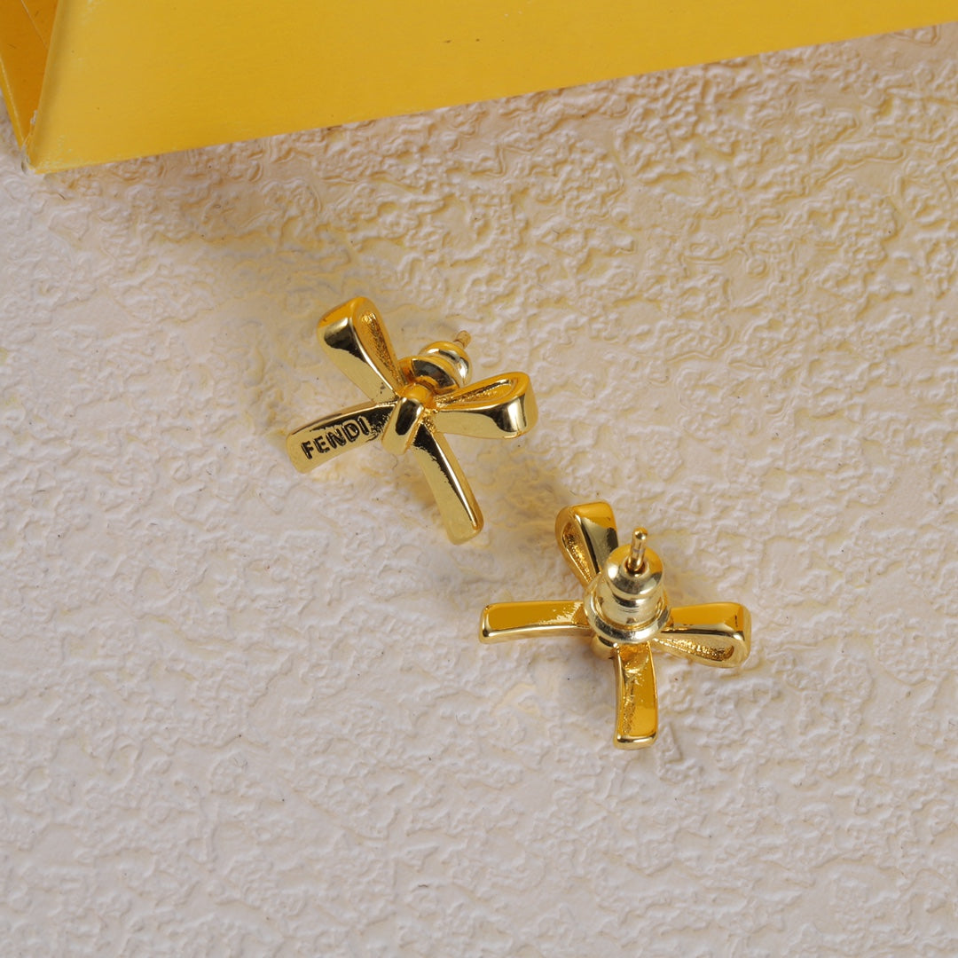 gold bow earrings