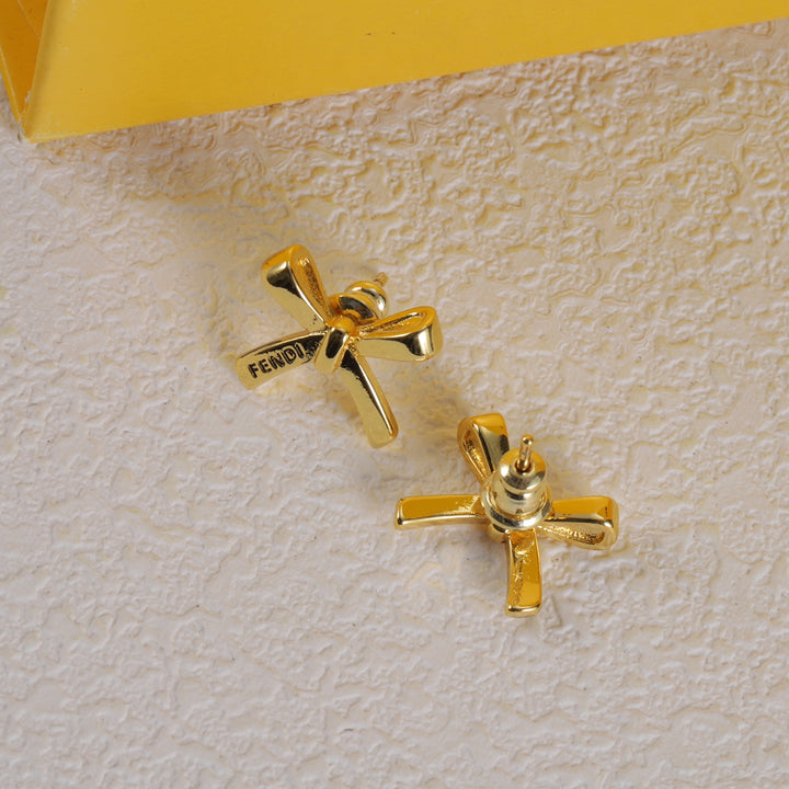 gold bow earrings