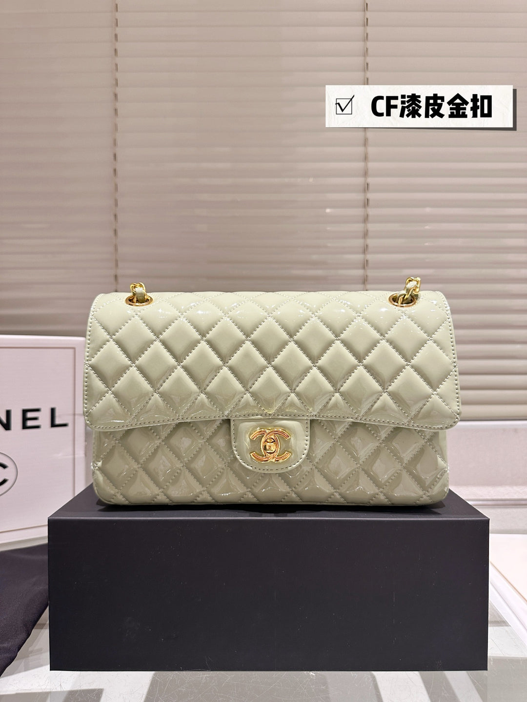 Two-tone light green quilted patent leather tote bag