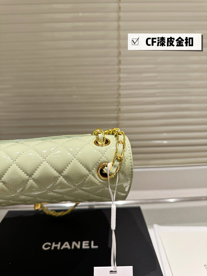 Two-tone light green quilted patent leather tote bag