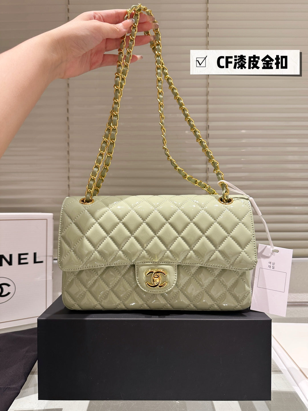 Two-tone light green quilted patent leather tote bag