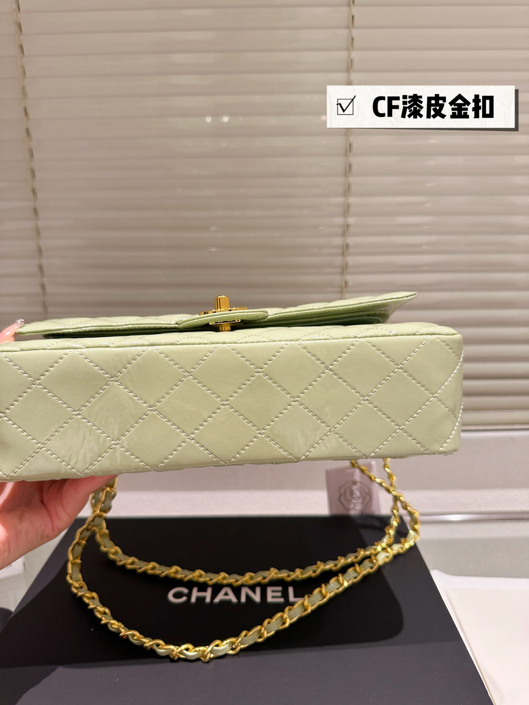 Two-tone light green quilted patent leather tote bag
