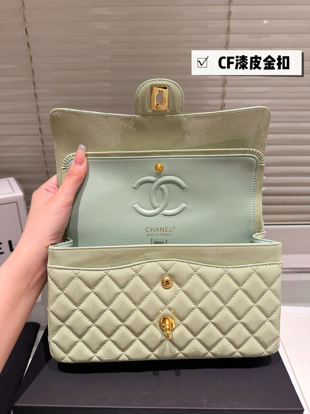 Two-tone light green quilted patent leather tote bag