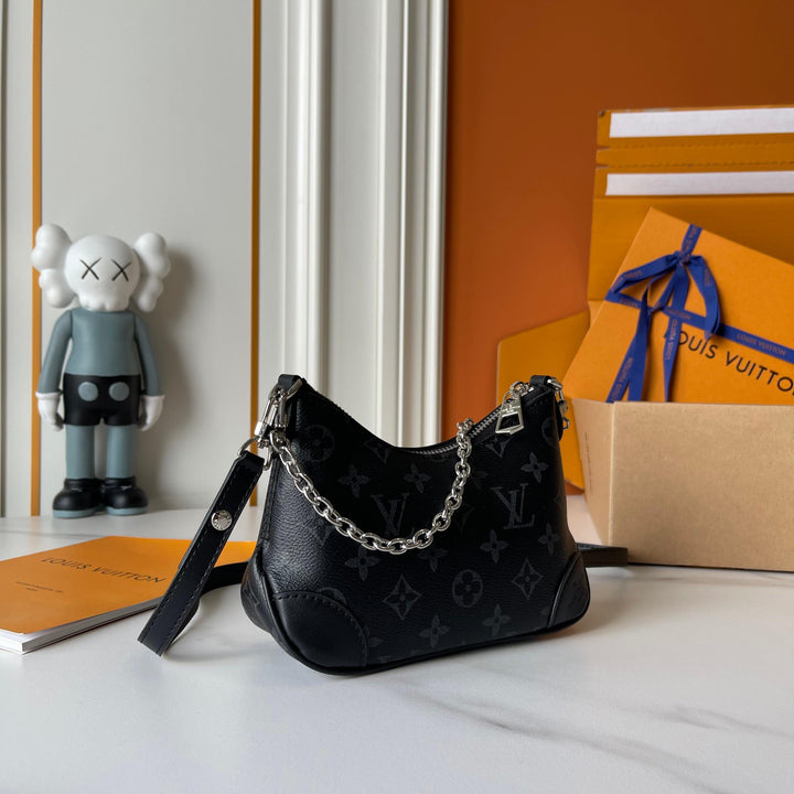 Two-tone four-leaf clover print horn handbag