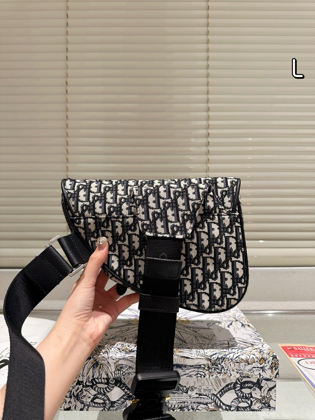 Fashionable woven letter logo saddle bag