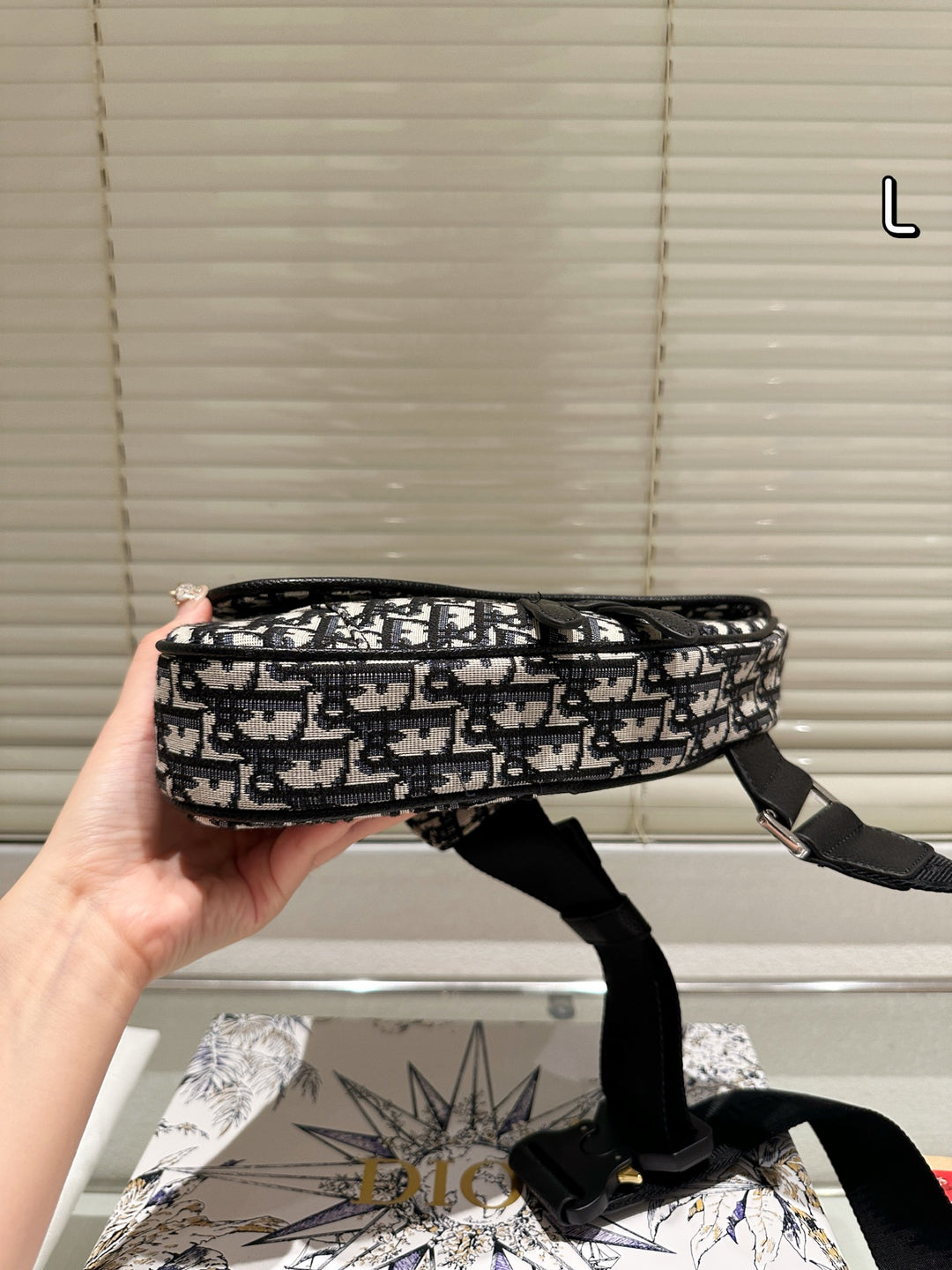 Fashionable woven letter logo saddle bag